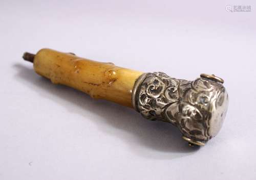 A 19TH CENTURY RHINOCEROS HORN & SILVER PARASOL HANDLE, 11CM