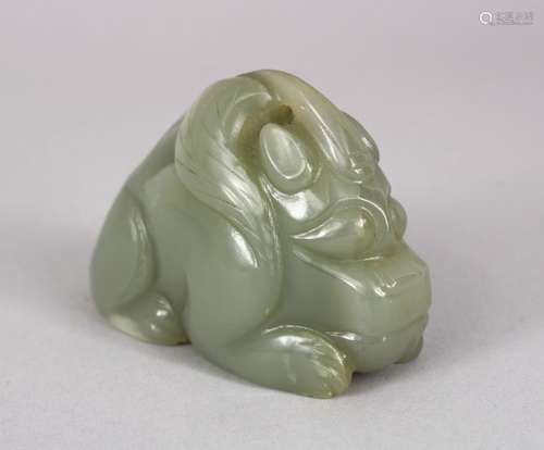 A CHINESE CARVED CELADON JADE FIGURE OF A MYTHICAL BEAST OR DRAGON, 8CM