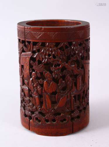 A 19TH CENTURY CHINESE CARVED BAMBOO CANTON BRUSH POT, decorated with figures amongst garden