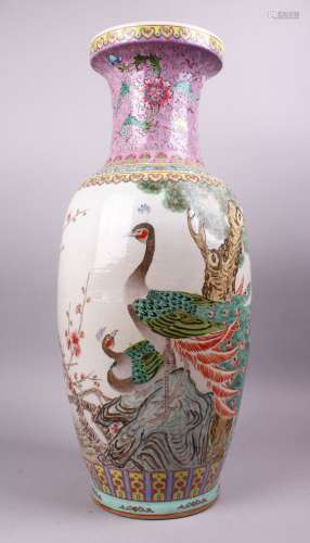 A LARGE CHINESE FAMILLE ROSE PORCELAIN PEACOCK VASE, with decoration of peacocks in landscapes