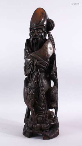 A LARGE 19TH / 20TH CENTURY CHINESE HARDWOOD & SILVER INLAID FIGURE OF SHOU LAO, stood aside deer