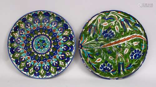 TWO LARGE JERUSALEM PALESTINIAN POTTERY DISHES, Both with formal floral decoration, one af, both