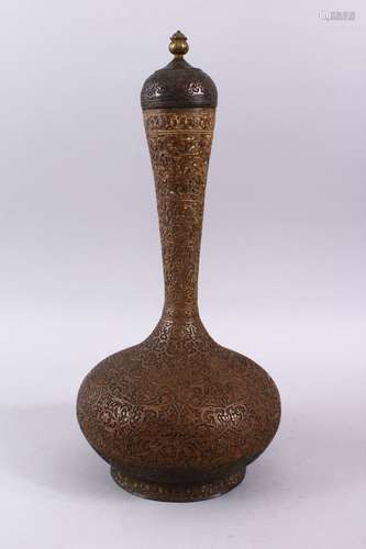 A LARGE 19TH CENTURY INDIAN COPPER LIDDED BOTTLE, with carved formal foliage scroll, 39cm high