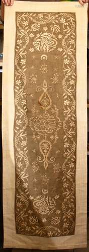 A GOOD TURKISH EMBROIDERED LONG TEXTILE - MIRROR COVER, with central embroidery of calligraphy and