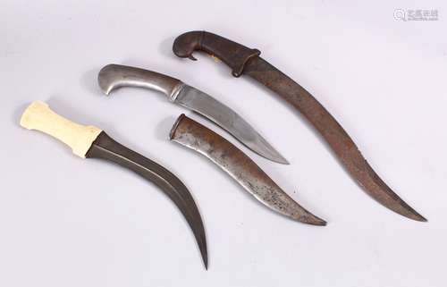 A COLLECTION OF 3 INDO PERSIAN DAGGERS - one with a bone handle, one with a white metal handles