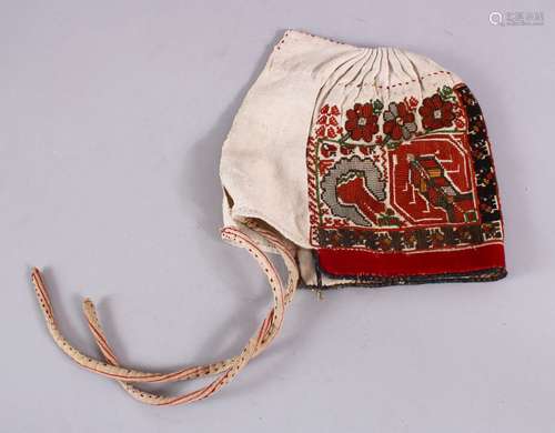 AN 18TH CENTURY TURKISH OTTOMAN BALKANGREEN EMBROIDERED HEAD COVER, embroidered with floral