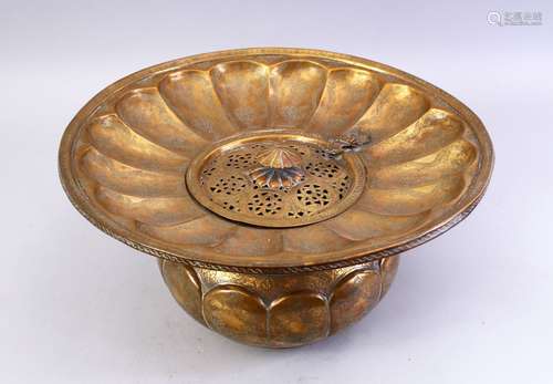 A GOOD LARGE 18TH/19TH CENTURY PERSIAN ENGRAVED BRASS BASIN, the centre with a hinged pierced cover,