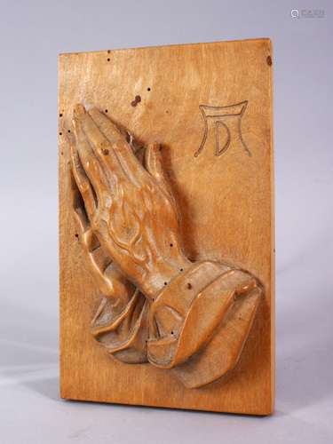 A GOOD CARVED WOODEN HANGING PREYING HANDS OF BUDDHA, with calligraphy to the upper right section