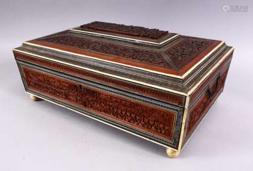 A 19TH CENTURY ANGLO INDIAN INLAID LIDDED SEWING BOX, with carved wood depicting figures and animals