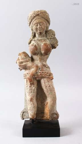 A RARE AND LARGE 2ND CENTURY BC INDIAN CLAY FIGURE OF A MOTHER, stood originally holding a child,