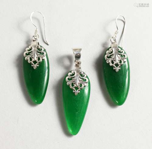 A SILVER AND JADE PENDANT, with a pair of matching earrings.