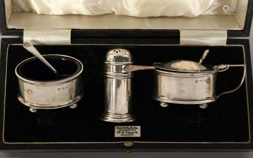 A THREE PIECE SILVER CONDIMENT SET. Birmingham.