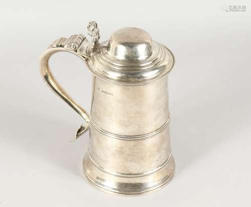 A GEORGE III SILVER LIDDED TANKARD, London 1808. 24ozs. 8.5ins high.