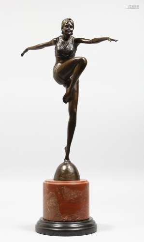 AN ART DECO STYLE BRONZE OF A DANCER on a circular marble base. 22ins high.