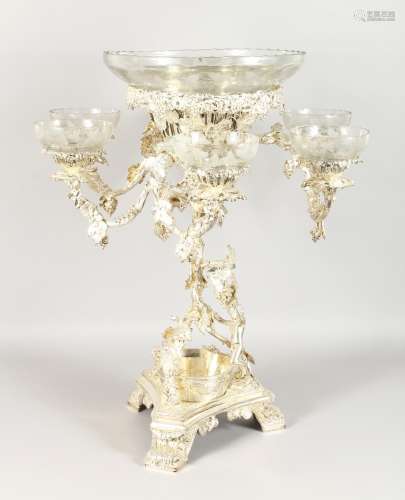 A LARGE AND IMPRESSIVE SILVER PLATED CENTREPIECE of naturalistic form, with a central cut glass bowl
