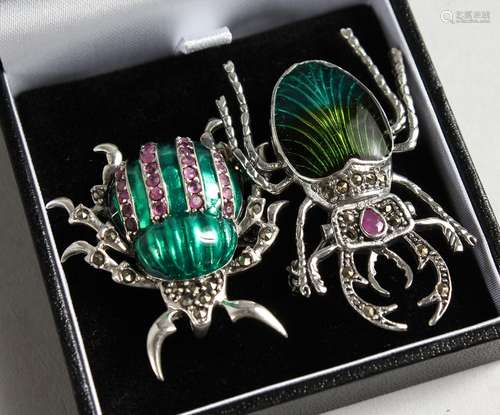 TWO SILVER RUBY AND ENAMEL BUG BROOCHES.