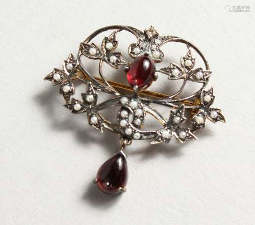 A 9CT GOLD AND SILVER, GARNET AND SEED PEARL BROOCH.