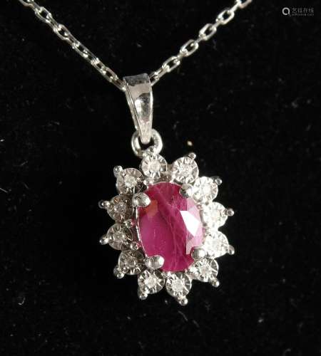 A GOOD 9CT GOLD, RUBY AND DIAMOND PENDANT ON CHAIN.