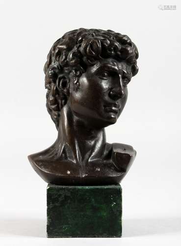 A SMALL BRONZE ROMAN STYLE BUST OF A MAN. 6.5ins high.