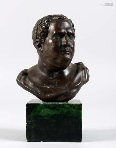 A SMALL BRONZE ROMAN STYLE BUST OF A MAN. 5.5ins high.