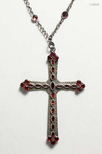 A SILVER AND GARNET CRUCIFIX ON CHAIN.