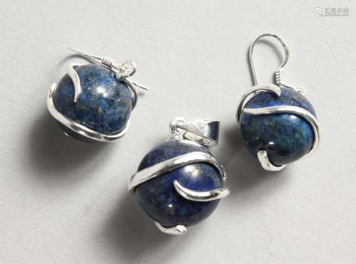 A SILVER AND LAPIS PENDANT with a pair of matching earrings.