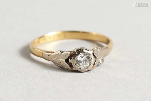 AN 18CT DIAMOND AND PLATINUM RING.