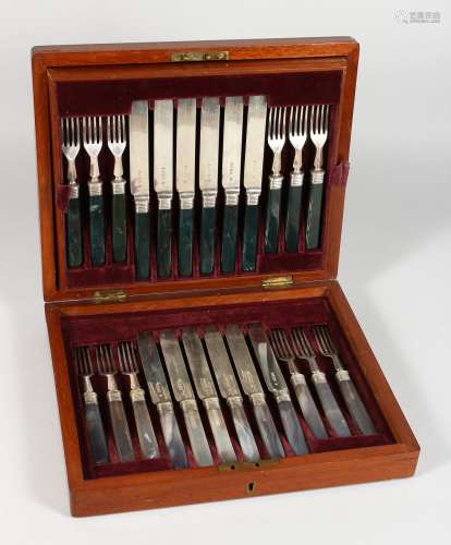 A CANTEEN OF TWELVE VICTORIAN SILVER DESSERT KNIVES AND FORKS, half with bloodstone handles, the