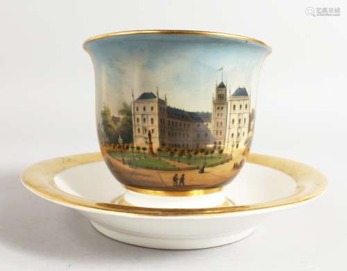 A BERLIN TOPOGRAPHICAL CUP AND SAUCER.