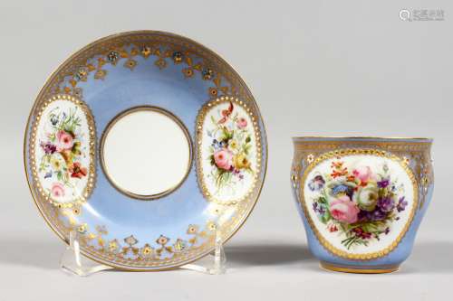 A GOOD SEVRES LILAC GROUND CUP AND SAUCER, edged in gilt and painted with flowers within beadwork.