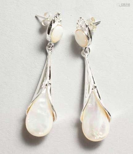 A PAIR OF SILVER AND PEARL EARRINGS.