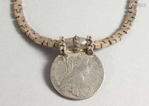 A GOOD HEAVY SILVER CHAIN with SILVER THERESIA.