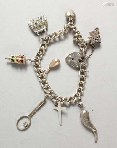 A GOOD SILVER CHARM BRACELET.