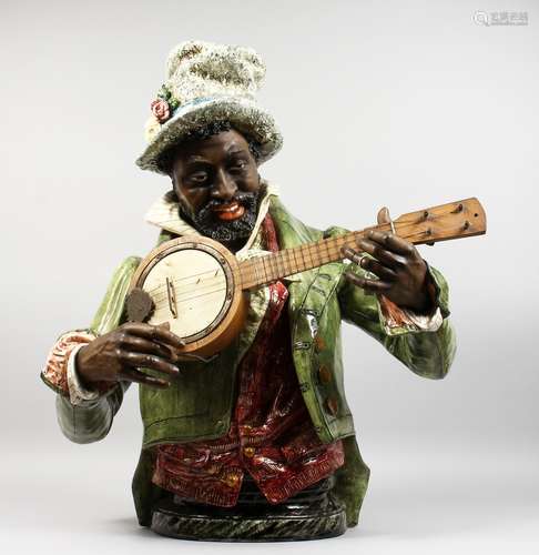 A SUPERB LARGE CONTINENTAL MAJOLICA PORCELAIN HALF-LENGTH FIGURE OF A MAN wearing a top hat and