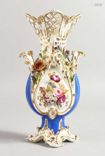 A COALPORT FINE VASE with pierced neck and encrusted flowers finely painted on a matte blue
