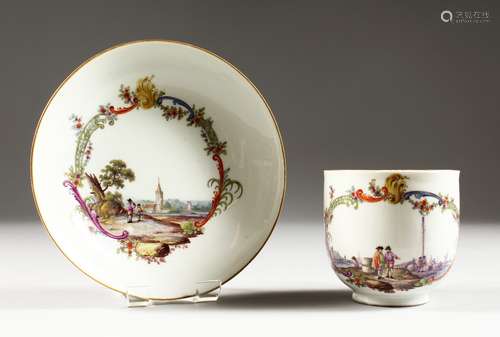 AN IMPORTANT MEISSEN CUP AND SAUCER, the cup painted with a group of merchants at a quayside, the