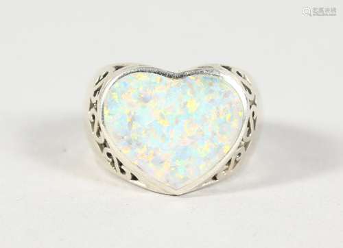 A SILVER AND OPAL RING.