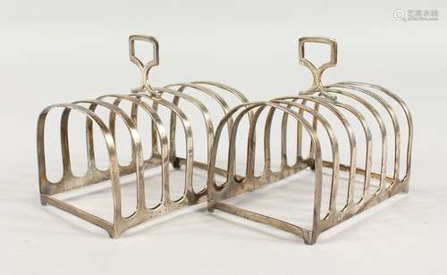 A PAIR OF SIX-DIVISION SILVER TOAST RACKS. Birmingham 1919.