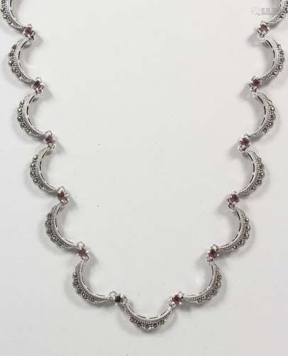 A SILVER AND MARCASITE NECKLACE.