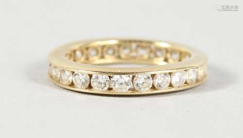AN 14CT GOLD SINGLE-ROW CZ ETERNITY RING.