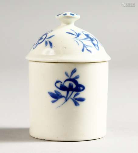 AN 18TH CENTURY MENNECY POMMADE POT AND COVER circa 1760 painted with blue flowers.