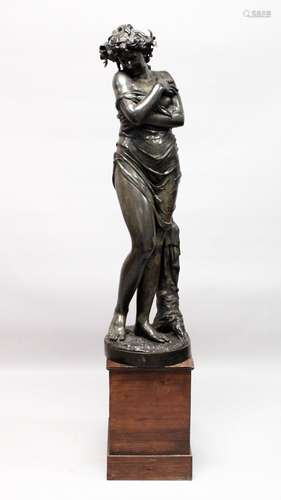 AFTER HOUDON (1741-1828) FRENCH A VERY LARGE BRONZE OF A STANDING FEMALE FIGURE with arms crossed,