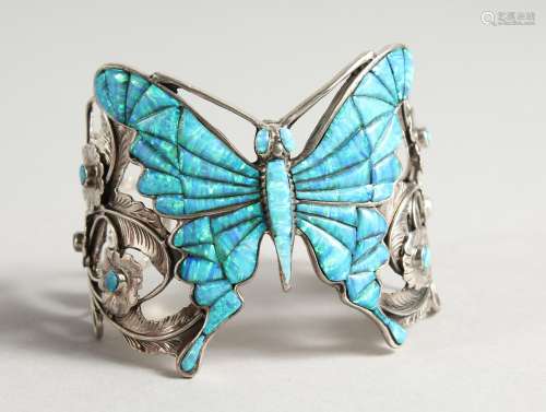 A LARGE HEAVY SOLID SILVER AND REAL OPAL BUTTERFLY BANGLE.