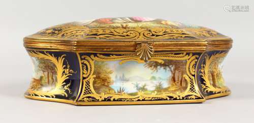 A SUPERB CONTINENTAL PORCELAIN SHAPED CASKET AND COVER, rich dark blue ground with gold