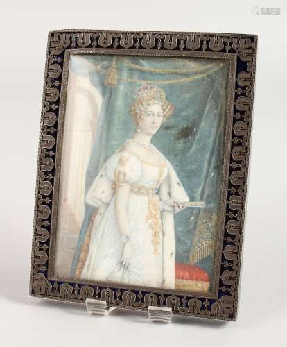 A SILVER AND ENAMEL RECTANGULAR UPRIGHT PHOTOGRAPH FRAME, portrait three-quarter length of a lady.