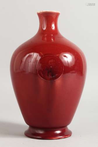 A MOORCROFT RICH RED BURSLEM VASE. 8.5ins high.