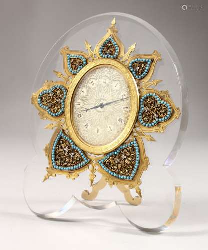 A SUPERB STRUTT CLOCK, on a shaped crystal frame, the oval dial with fine engraving, surrounded by