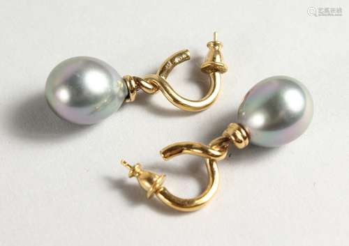 A PAIR OF BLACK PEARL EARRINGS.