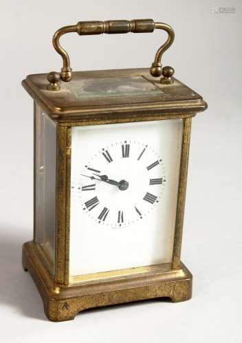 A 19TH CENTURY FRENCH BRASS TIMEPIECE. 4.5ins high.
