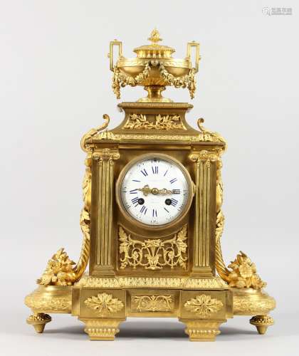 A VERY GOOD LOUIS XVI GILT ORMOLU MANTLE CLOCK, with white enamel dial, blue and white Roman